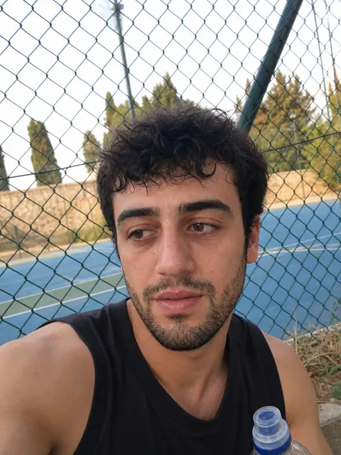 Demo profile supporting shot: a courtside selfie after a run